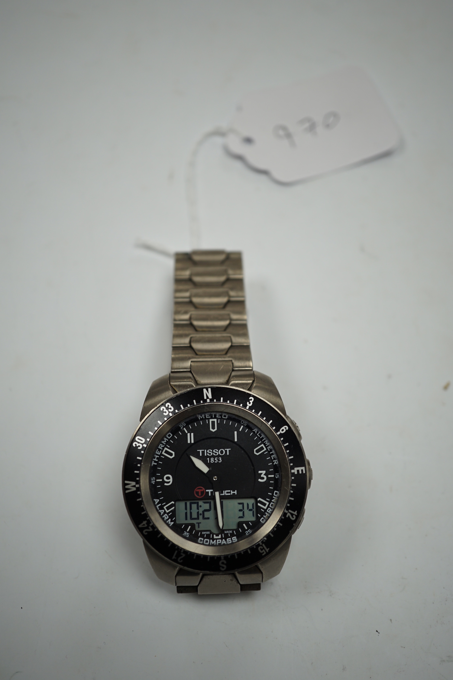 A gentleman's titanium Tissot Touch Expert analogue and digital quartz wrist watch, with box and pamphlets.